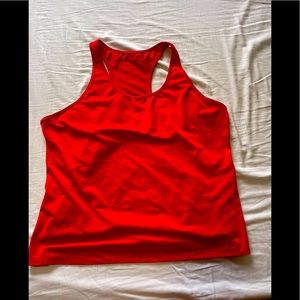 Workout top. Lightly worn, vibrant red/orange colour.
